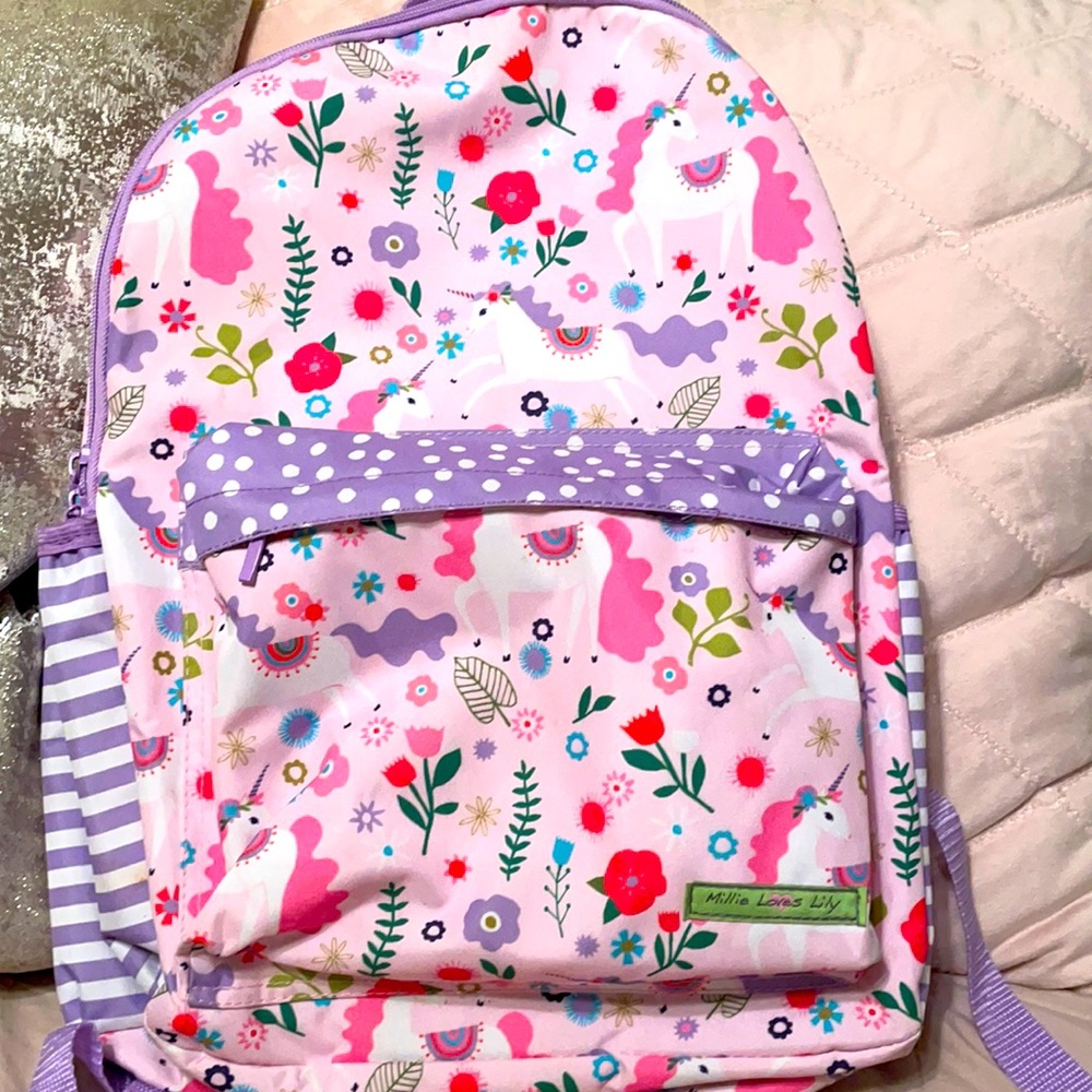 Unicorn backpack with Lavender & white Stripes & polka dots. Very good shape.
